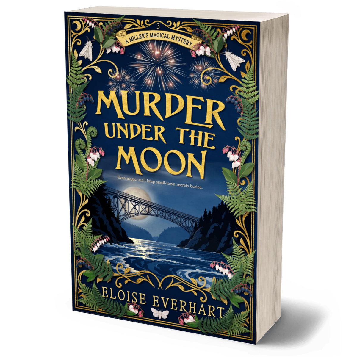 A paperback book titled 'Murder Under the Moon' a paranormal cozy mystery by Eloise Everhart, featuring an ornate dark blue cover with gold lettering, a bridge over water, fireworks, and green foliage.